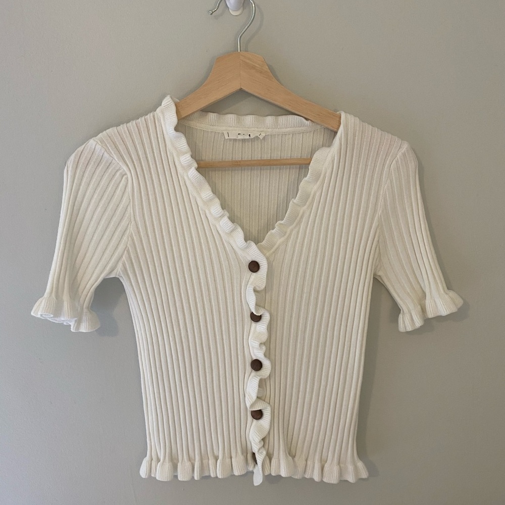 White ruffle button up top